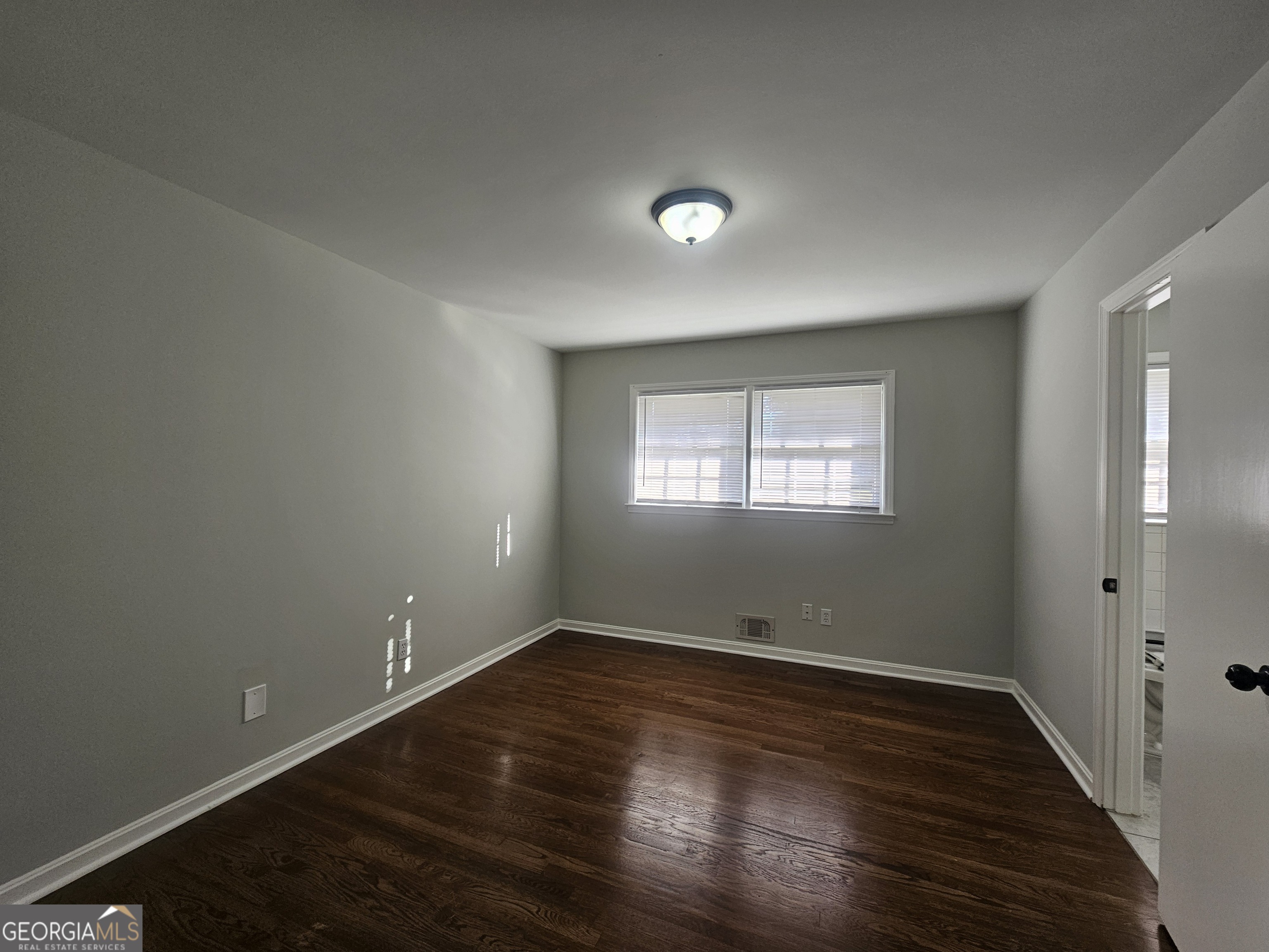 3750 Citation Drive Decatur, GA 30034 - Photo 30 of 44 an empty room with wooden floor and windows