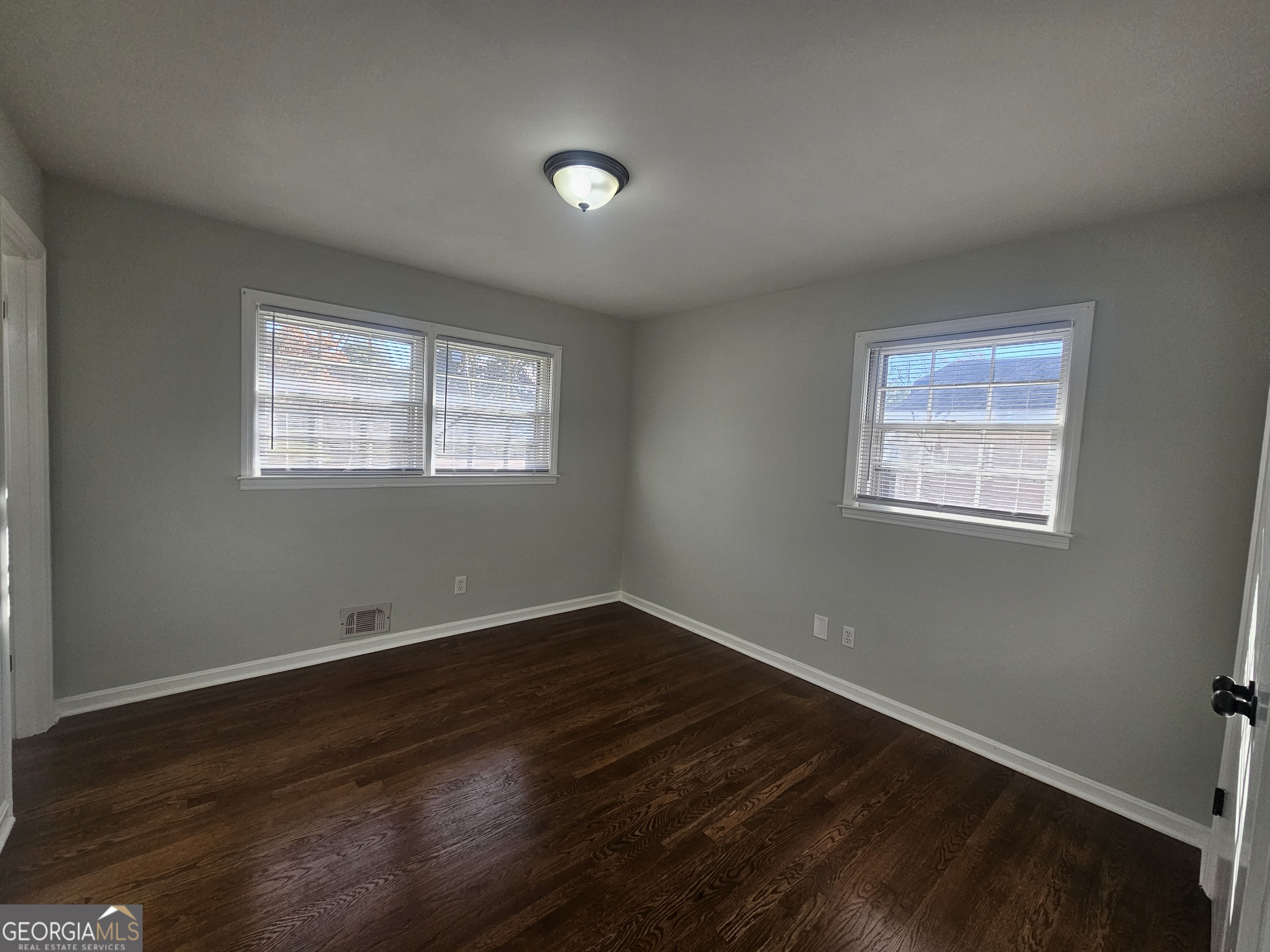 3750 Citation Drive Decatur, GA 30034 - Photo 32 of 44 a view of an empty room with wooden floor and a window