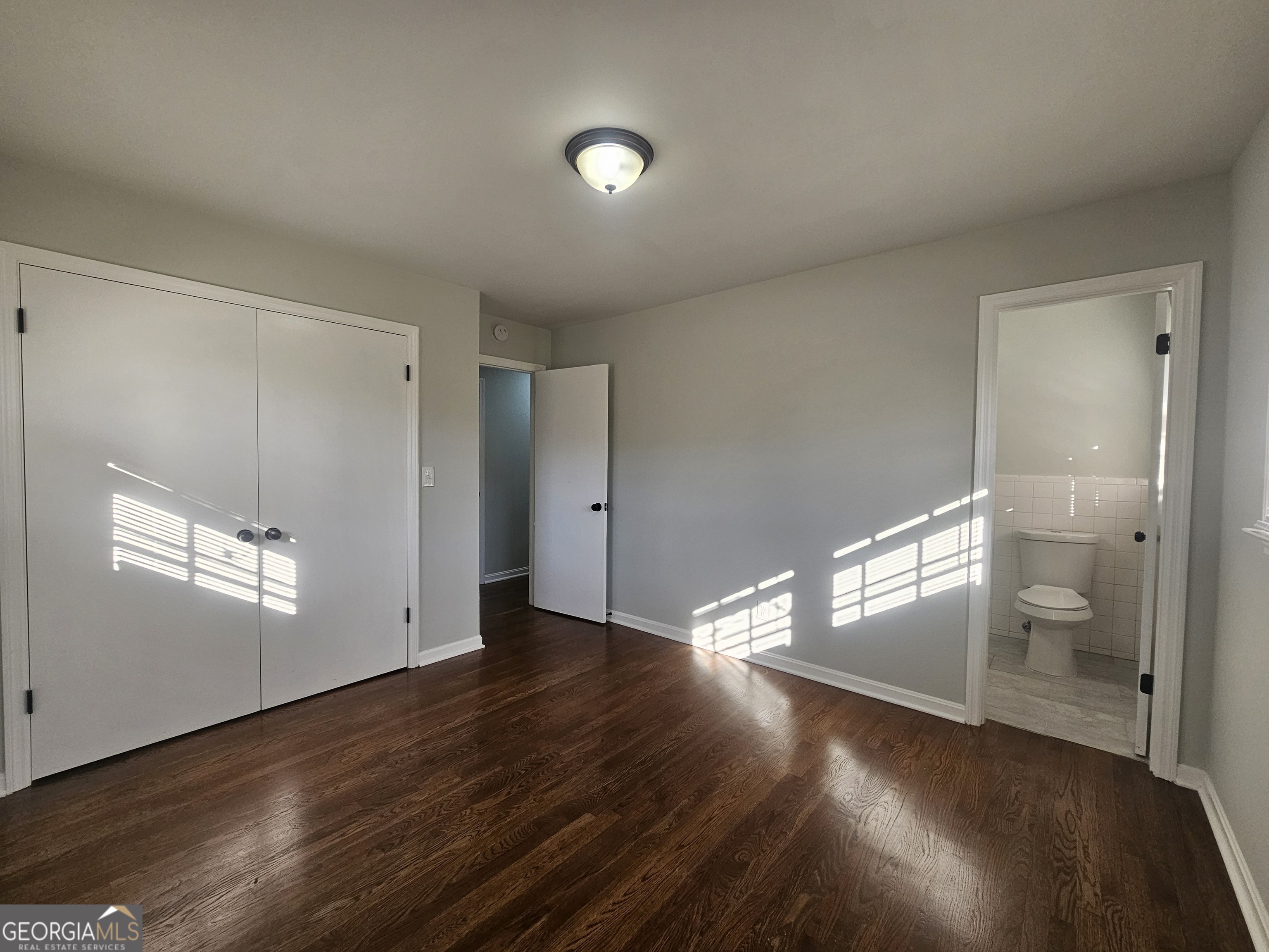 3750 Citation Drive Decatur, GA 30034 - Photo 33 of 44 an empty room with wooden floor and windows