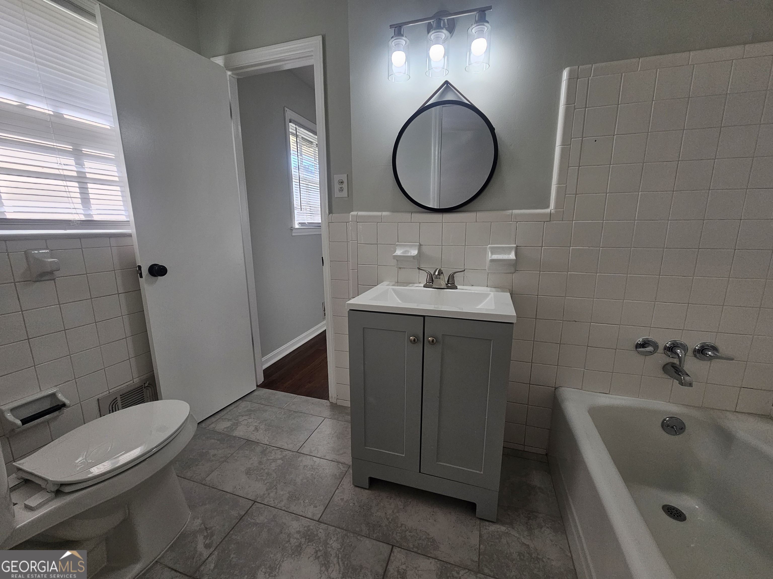 3750 Citation Drive Decatur, GA 30034 - Photo 34 of 44 a bathroom with a toilet sink and mirror