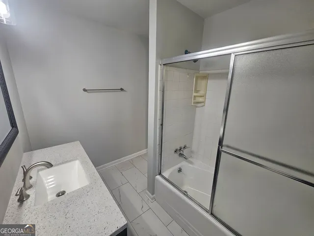 a bathroom with a bathtub