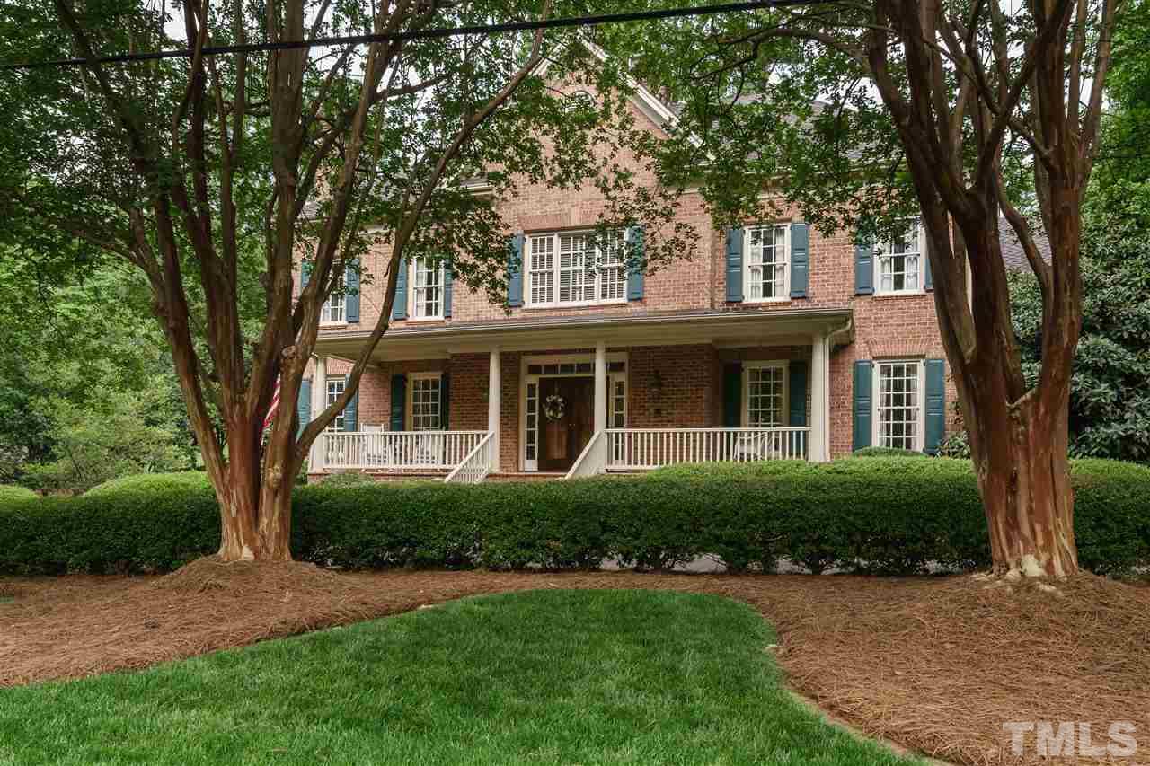 3103 Landor Road Raleigh, NC 27609 - Photo 2 of 25 a front view of a house with a garden