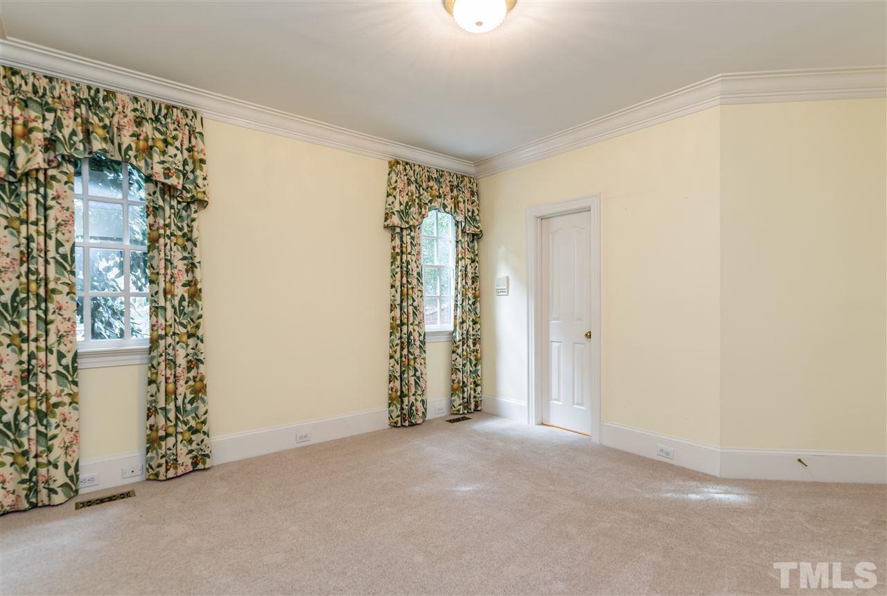 3103 Landor Road Raleigh, NC 27609 - Photo 13 of 25 a view of an empty room with a window
