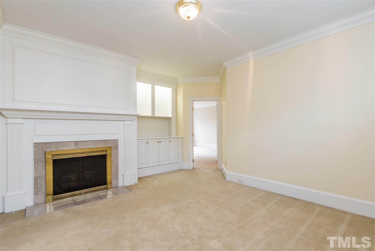 3103 Landor Road Raleigh, NC 27609 - Photo 16 of 25 a view of empty room with a fireplace