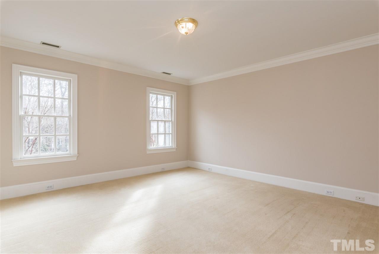 3103 Landor Road Raleigh, NC 27609 - Photo 17 of 25 an empty room with windows and closet