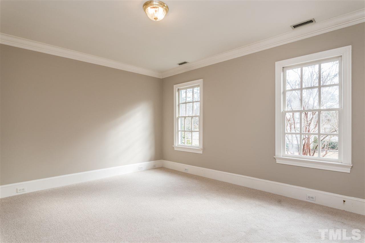 3103 Landor Road Raleigh, NC 27609 - Photo 19 of 25 an empty room with windows