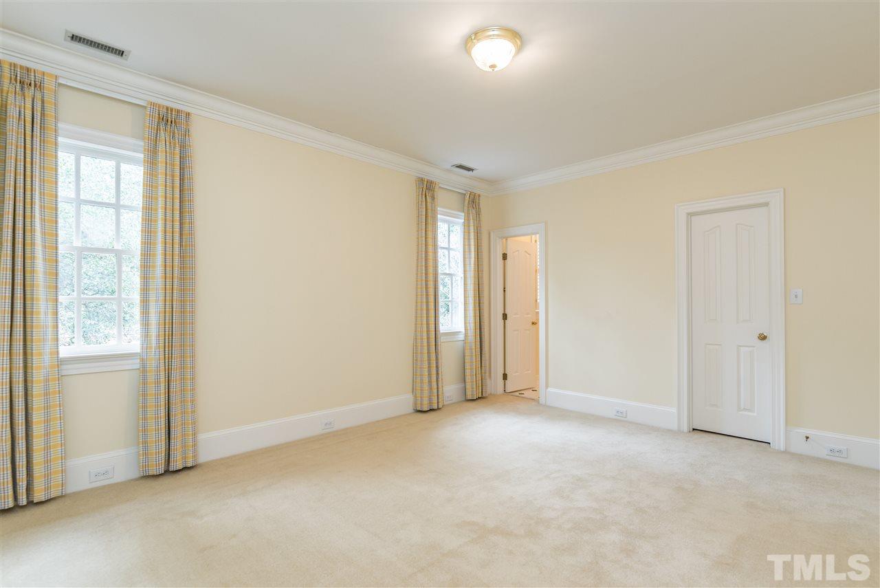 3103 Landor Road Raleigh, NC 27609 - Photo 20 of 25 a view of an empty room and a window
