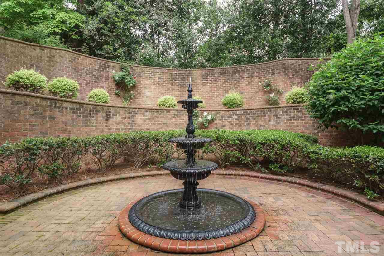 3103 Landor Road Raleigh, NC 27609 - Photo 23 of 25 a view of fountain in a backyard
