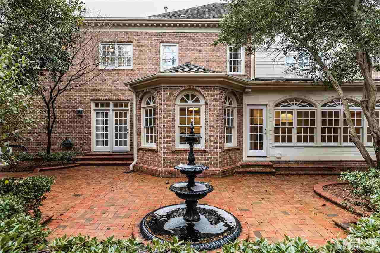 3103 Landor Road Raleigh, NC 27609 - Photo 24 of 25 a front view of a house with garden