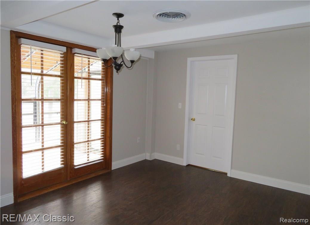 1967 East Commerce Road Commerce Township, MI 48382 - Photo 11 of 33 Roomy dining area with French doors