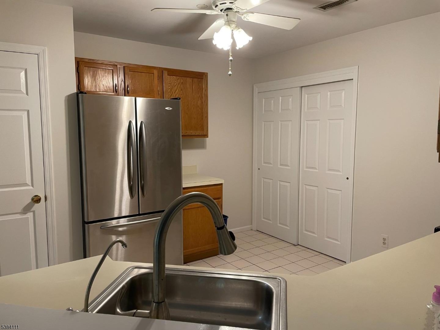 12 Leva Drive, Unit 12 Morristown, NJ 07960 - Photo 19 of 30 a kitchen with a refrigerator and a sink