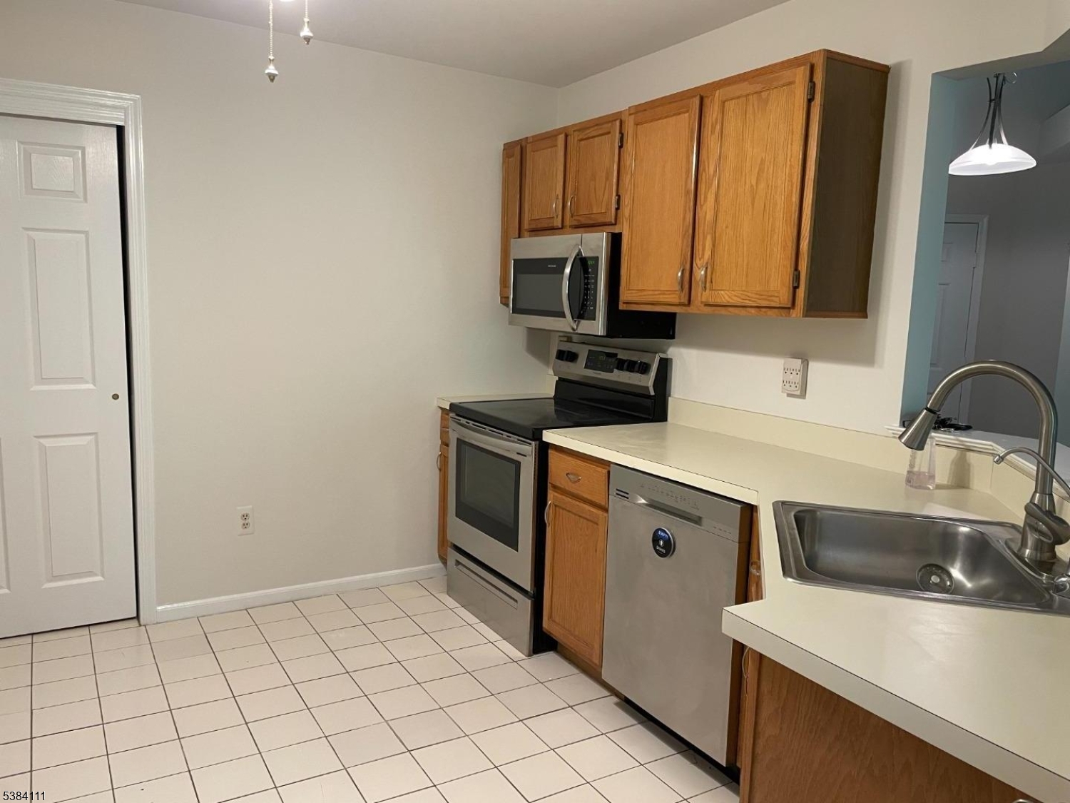 12 Leva Drive, Unit 12 Morristown, NJ 07960 - Photo 20 of 30 a kitchen with a sink cabinets and appliances