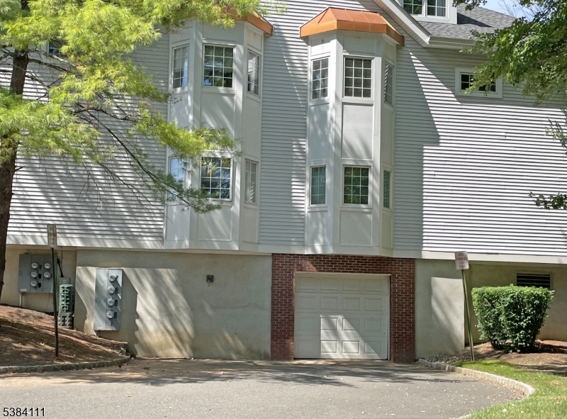 12 Leva Drive, Unit 12 Morristown, NJ 07960 - Photo 3 of 30 a front view of a house with garage