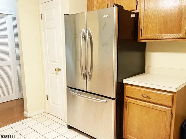 a view of a refrigerator and a refrigerator
