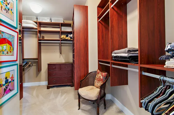 a view of storage utility and utility room with washer and dryer