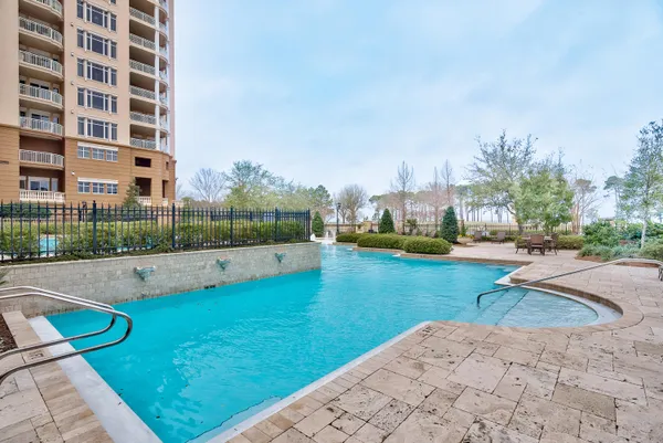 front view of a building with a swimming pool
