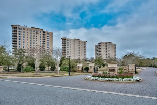 a view of a city with tall buildings in the background