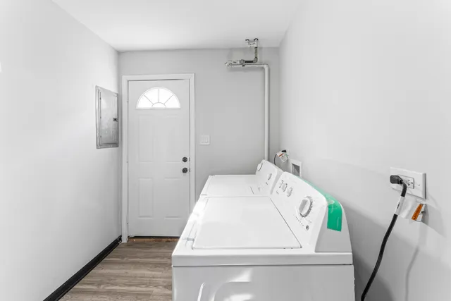 a utility room with a window dryer and washer
