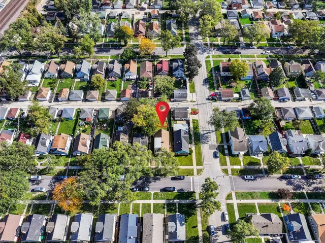a picture of a bench in front of a white wall