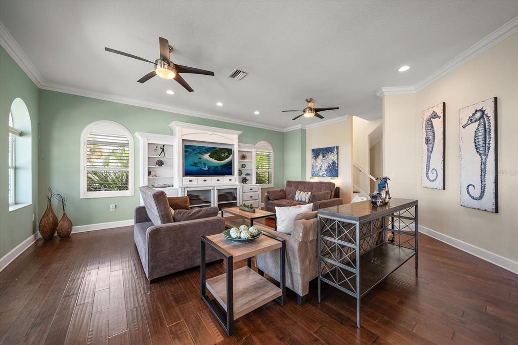 478 Harbor Drive South Indian Rocks Beach, FL 33785 - Photo 14 of 73 a living room with furniture wooden floor and window
