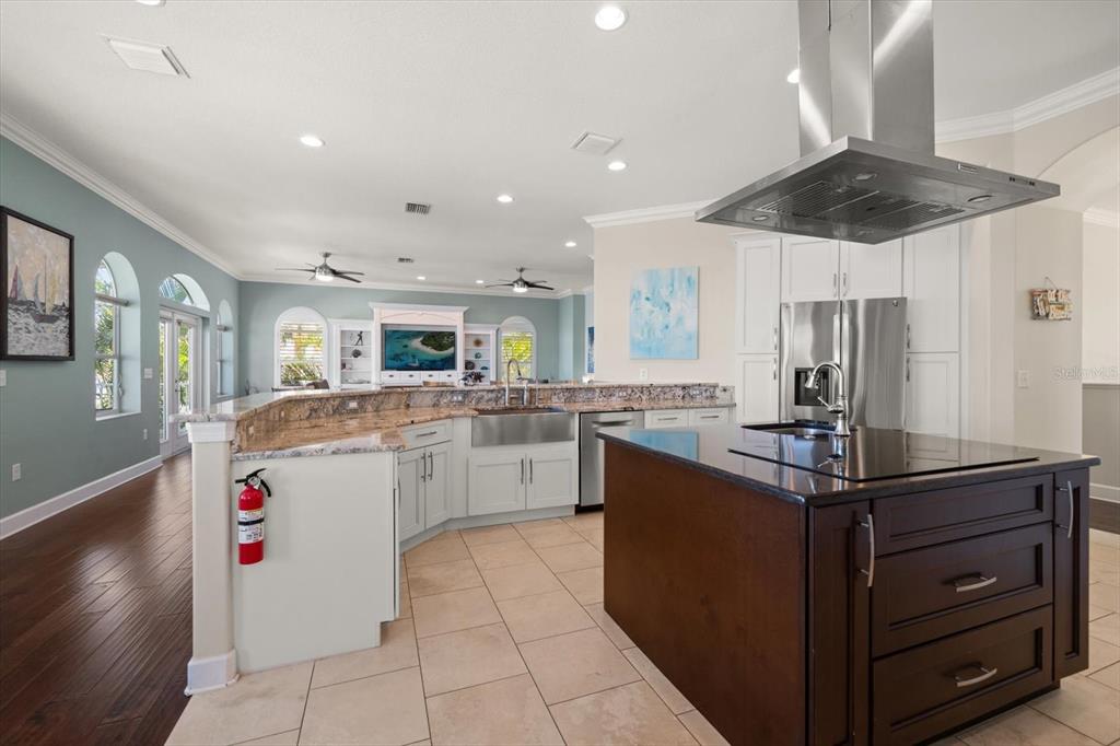 478 Harbor Drive South Indian Rocks Beach, FL 33785 - Photo 21 of 73 a kitchen with a sink and cabinets