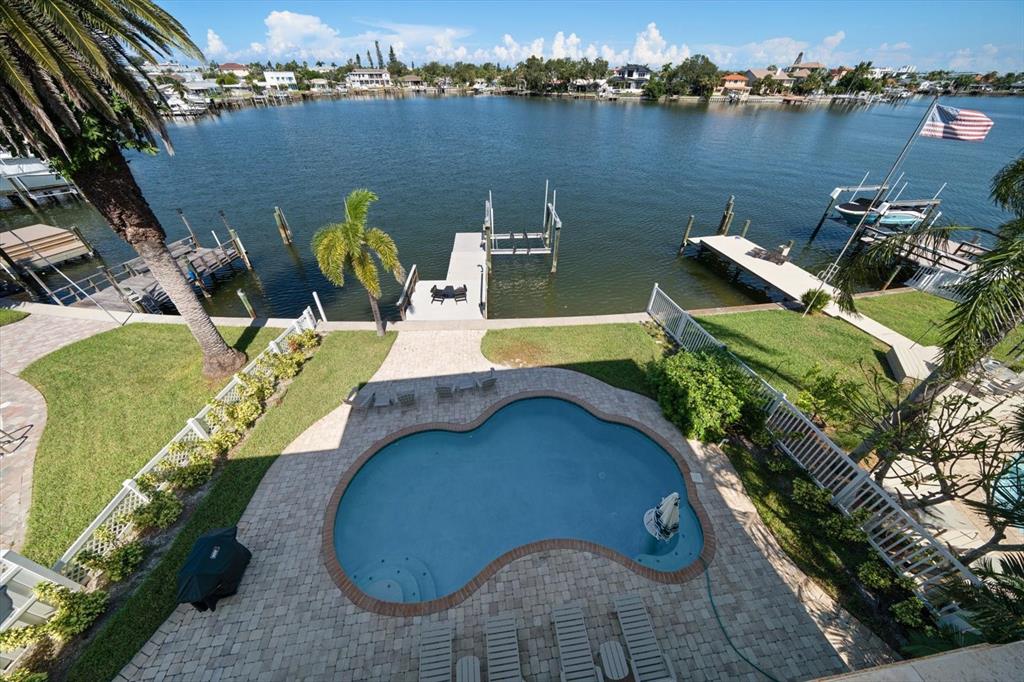 478 Harbor Drive South Indian Rocks Beach, FL 33785 - Photo 25 of 73 an aerial view of a house with outdoor space and a lake view