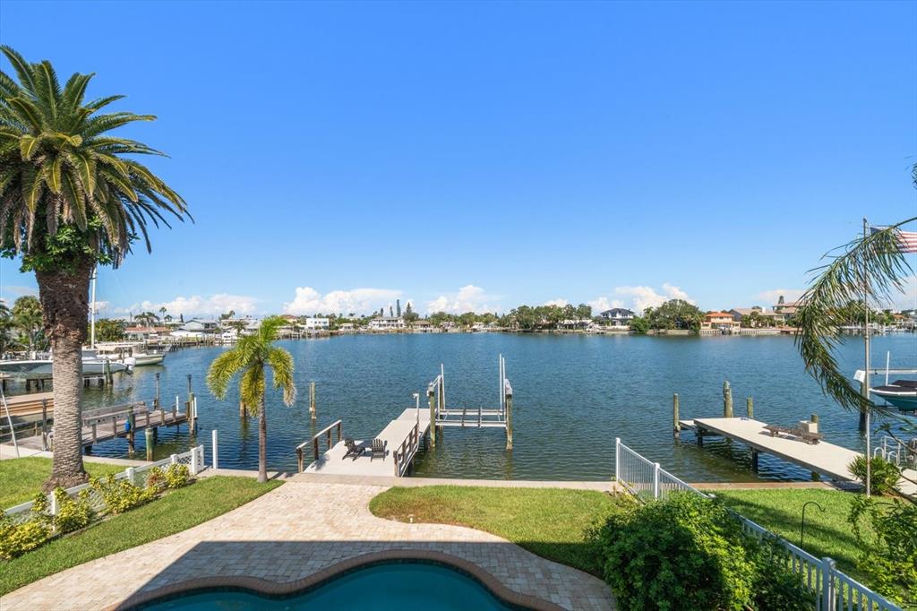 478 Harbor Drive South Indian Rocks Beach, FL 33785 - Photo 29 of 73 a view of a lake with couches chairs