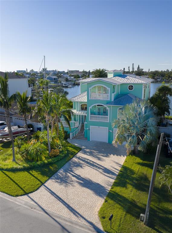 478 Harbor Drive South Indian Rocks Beach, FL 33785 - Photo 54 of 73 a view of a house with a yard