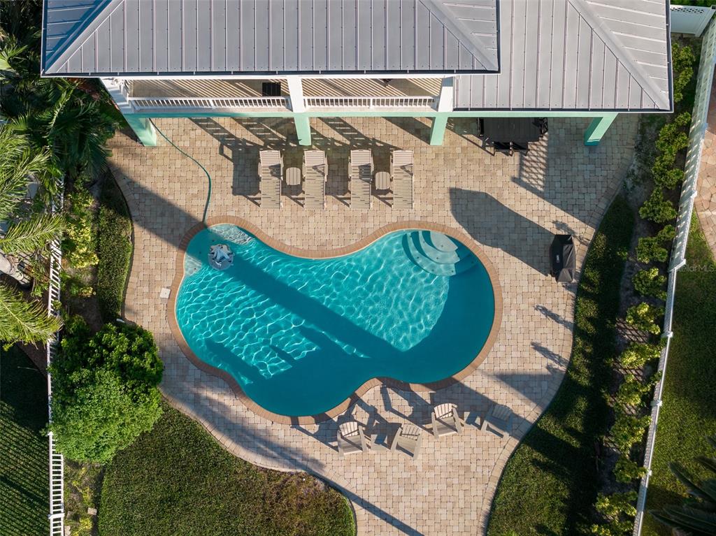 478 Harbor Drive South Indian Rocks Beach, FL 33785 - Photo 56 of 73 an aerial view of a house with a yard and sitting area