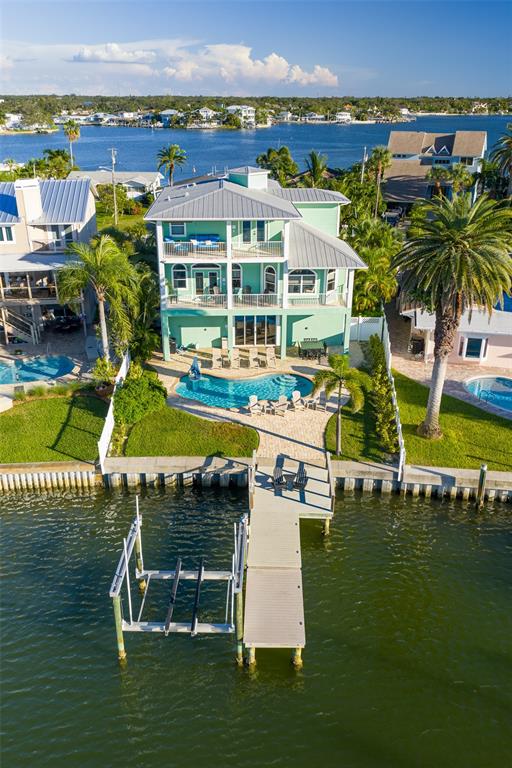 478 Harbor Drive South Indian Rocks Beach, FL 33785 - Photo 66 of 73 an aerial view of a house with a garden and lake view