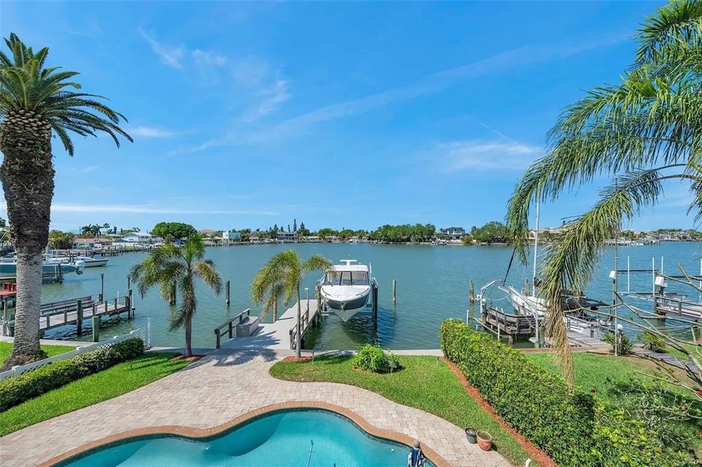 478 Harbor Drive South Indian Rocks Beach, FL 33785 - Photo 68 of 73 a view of a lake with a building in the background