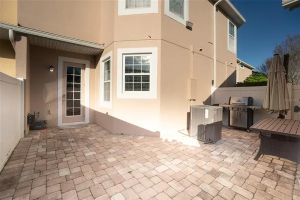 a view of a backyard of the house