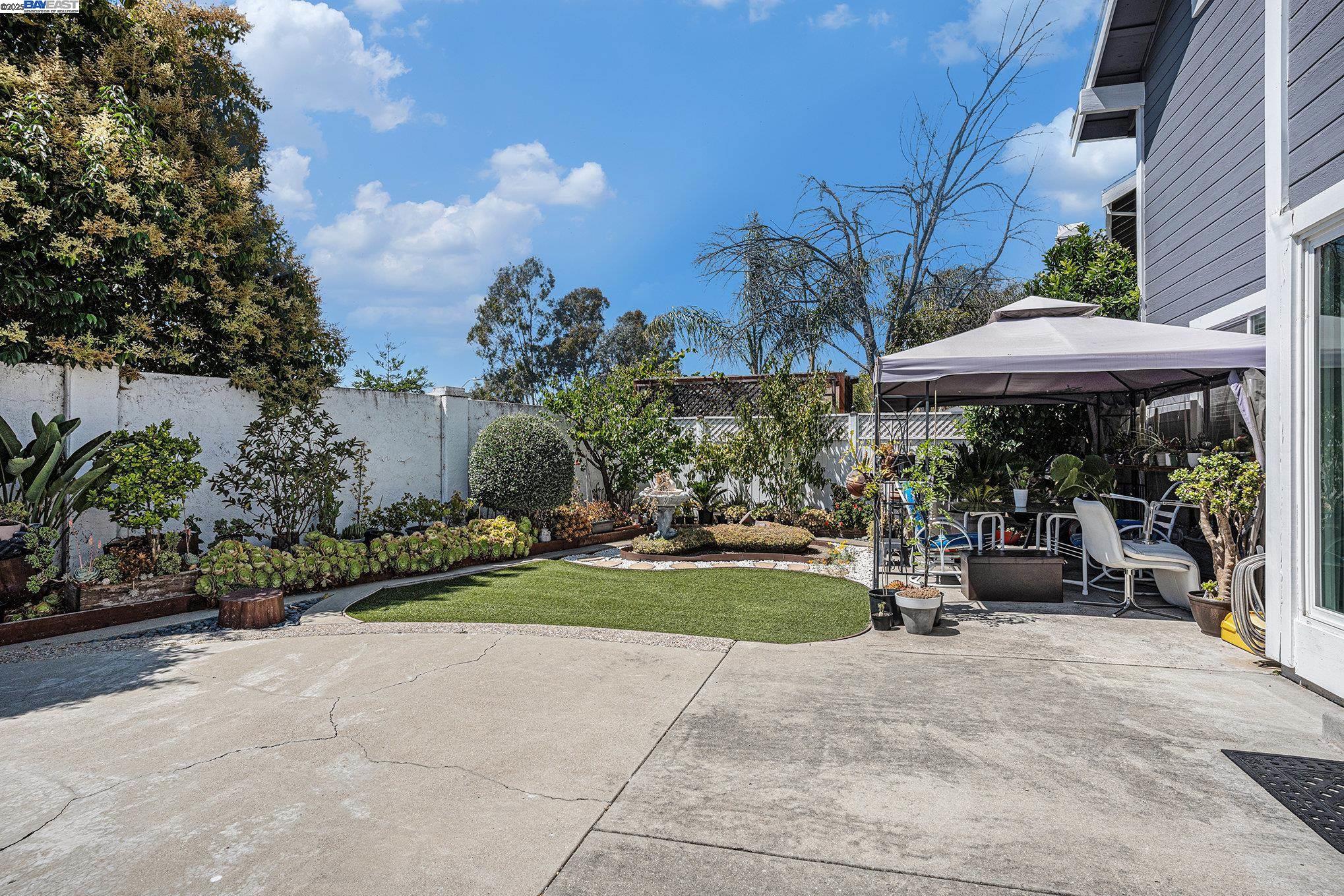 111 Overacker Terrace Fremont, CA 94536 - Photo 29 of 33 a view of a chairs and tables in the patio along a garden