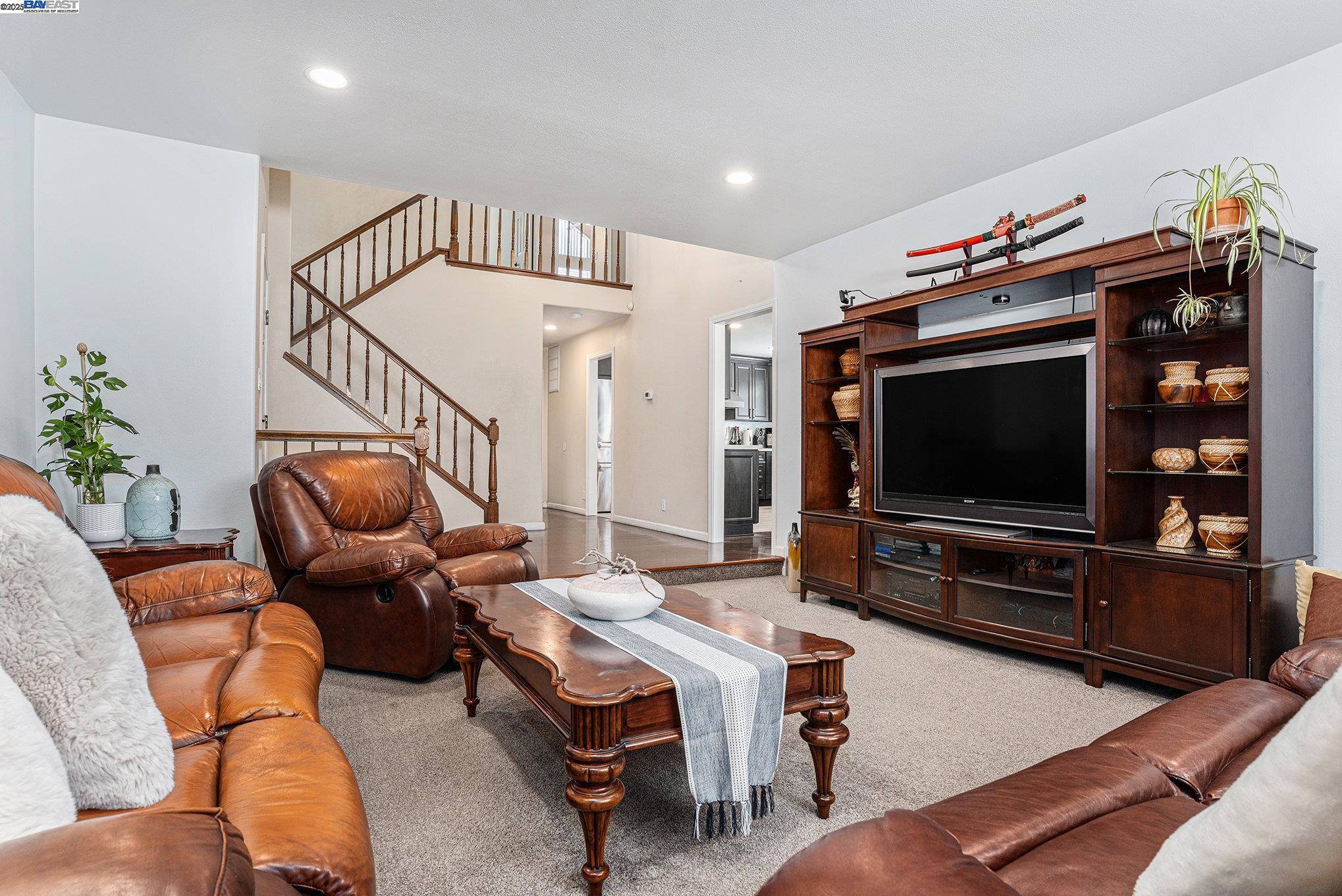 111 Overacker Terrace Fremont, CA 94536 - Photo 6 of 33 a living room with furniture and a flat screen tv