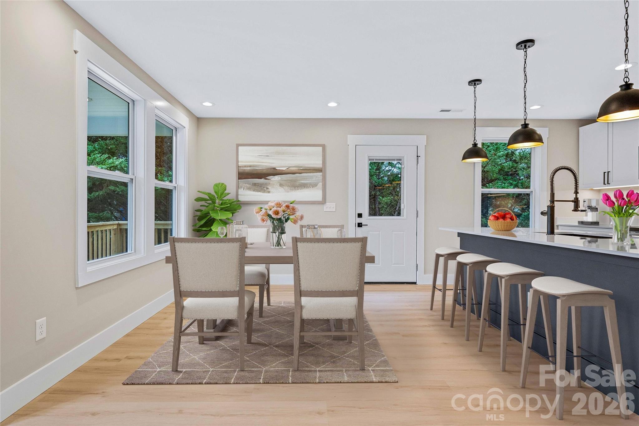 14 Knox Road Black Mountain, NC 28711 - Photo 18 of 44 a dining room with furniture window and wooden floor