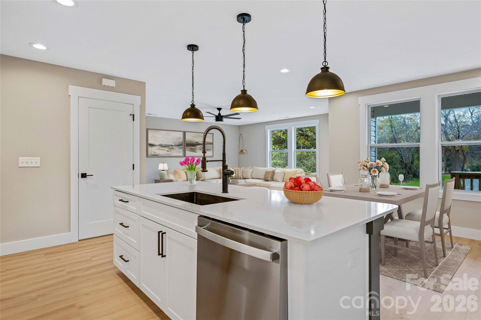 14 Knox Road Black Mountain, NC 28711 - Photo 23 of 44 a kitchen view with stainless steel appliances and dining table