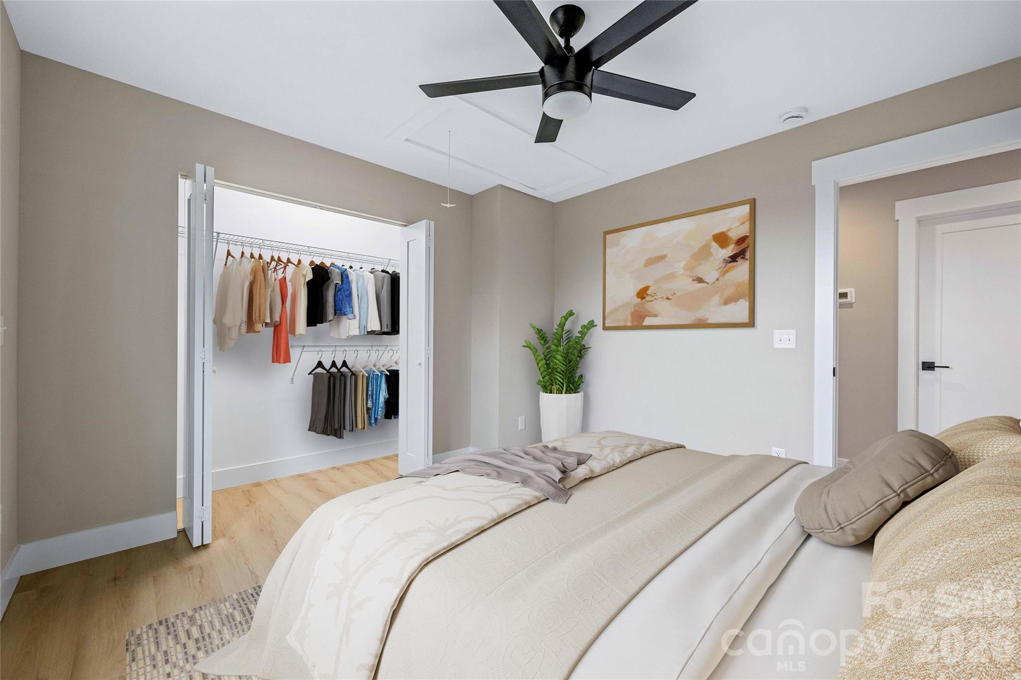 14 Knox Road Black Mountain, NC 28711 - Photo 38 of 44 a bedroom with a large bed and a chandelier
