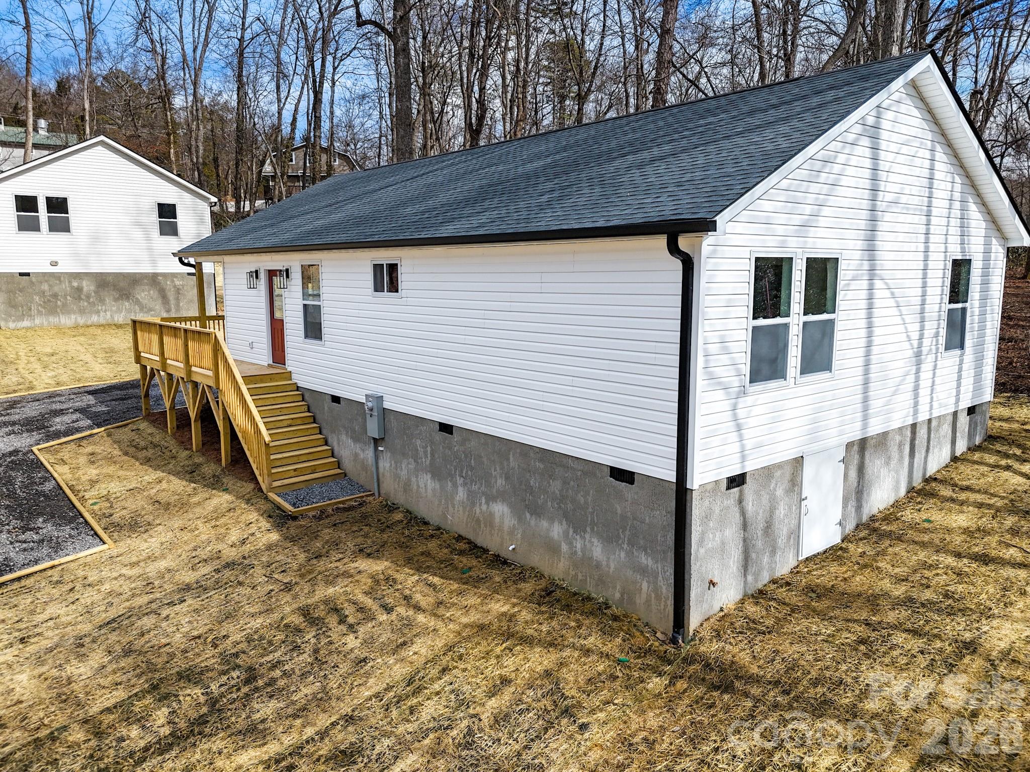 14 Knox Road Black Mountain, NC 28711 - Photo 4 of 44 a view of a house with a wooden deck