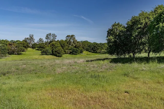 a view of mountain with lake view