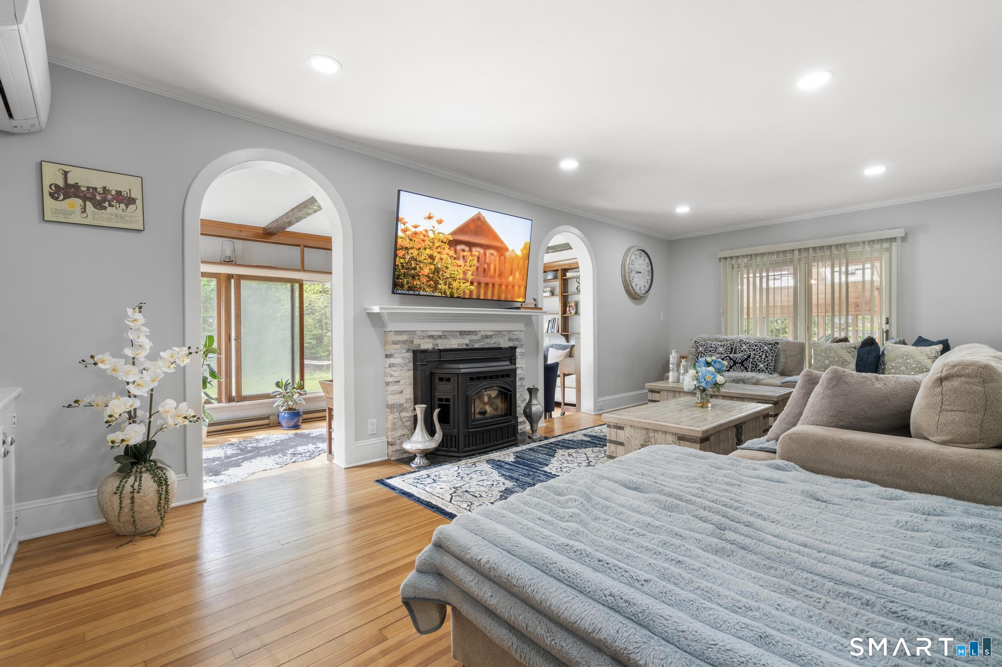15 Pent Road Deep River, CT 06417 - Photo 8 of 36 a living room with furniture and a fireplace