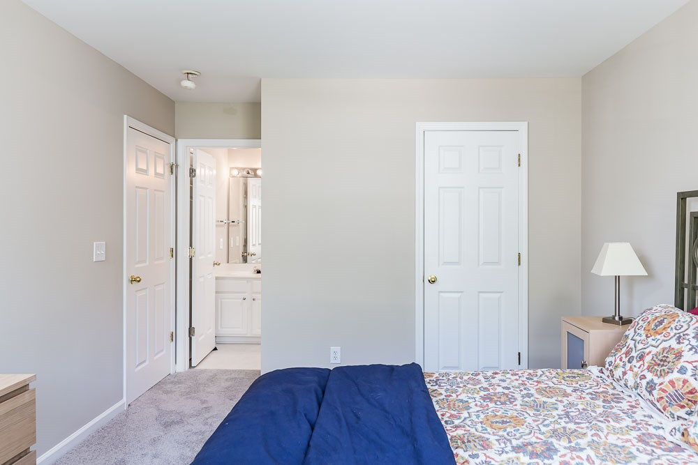 5419 Regatta Way Raleigh, NC 27613 - Photo 20 of 27 a bedroom with a bed and a closet