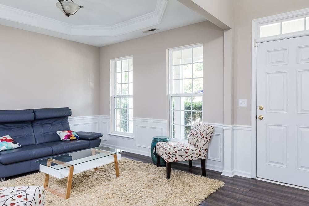5419 Regatta Way Raleigh, NC 27613 - Photo 2 of 27 a living room with furniture and wooden floor