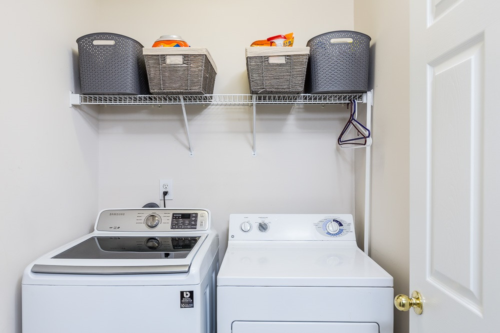 5419 Regatta Way Raleigh, NC 27613 - Photo 23 of 27 a utility room with dryer and washer