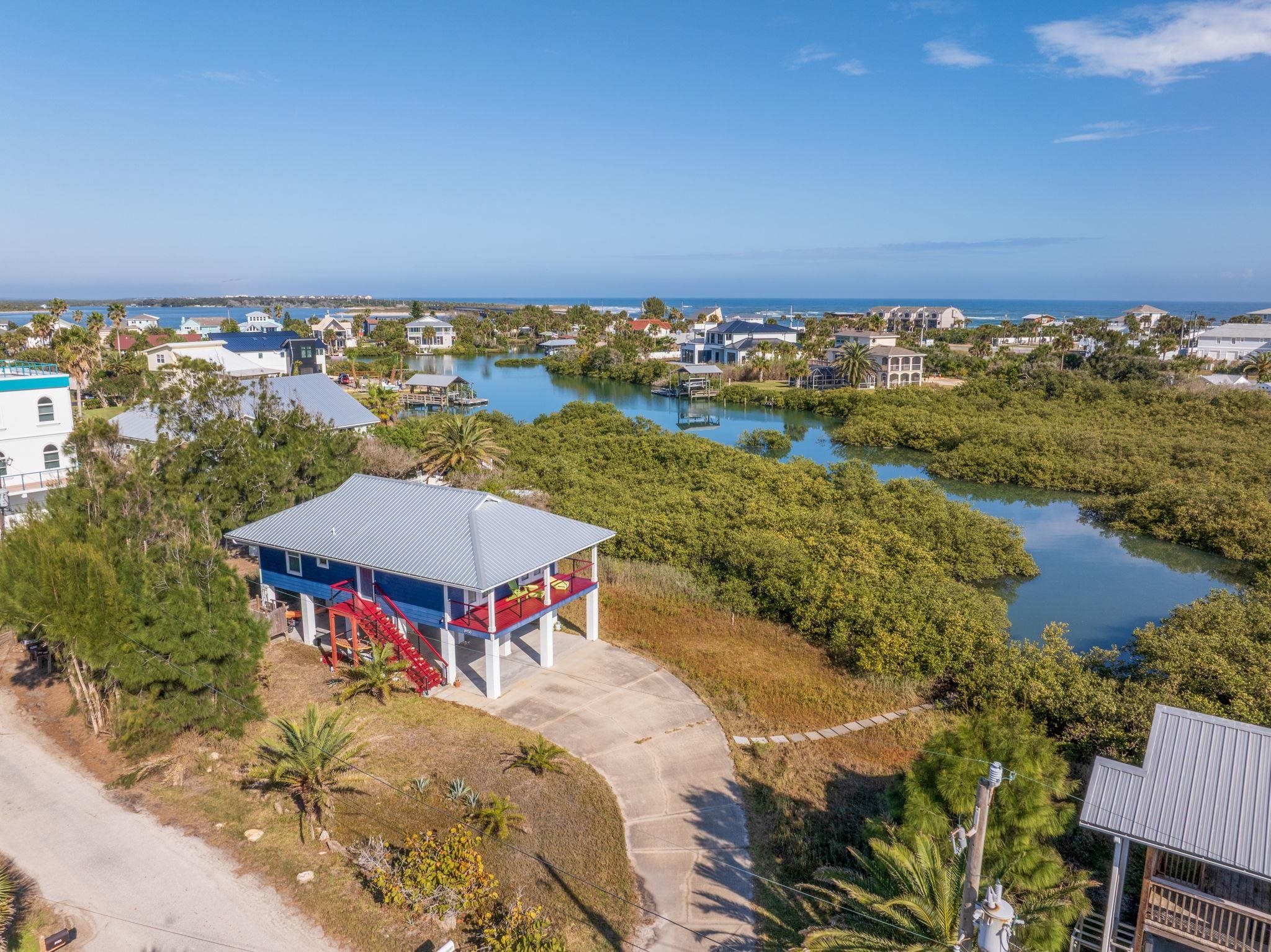 8950 Gene Johnson Road St. Augustine, FL 32080 - Photo 1 of 31 an aerial view of a house with a ocean view