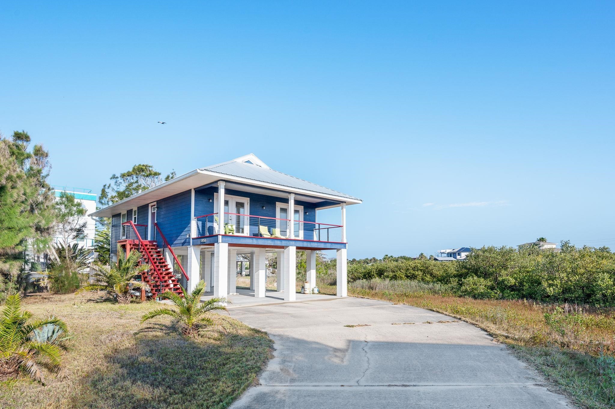 8950 Gene Johnson Road St. Augustine, FL 32080 - Photo 2 of 31 a view of a house with a yard