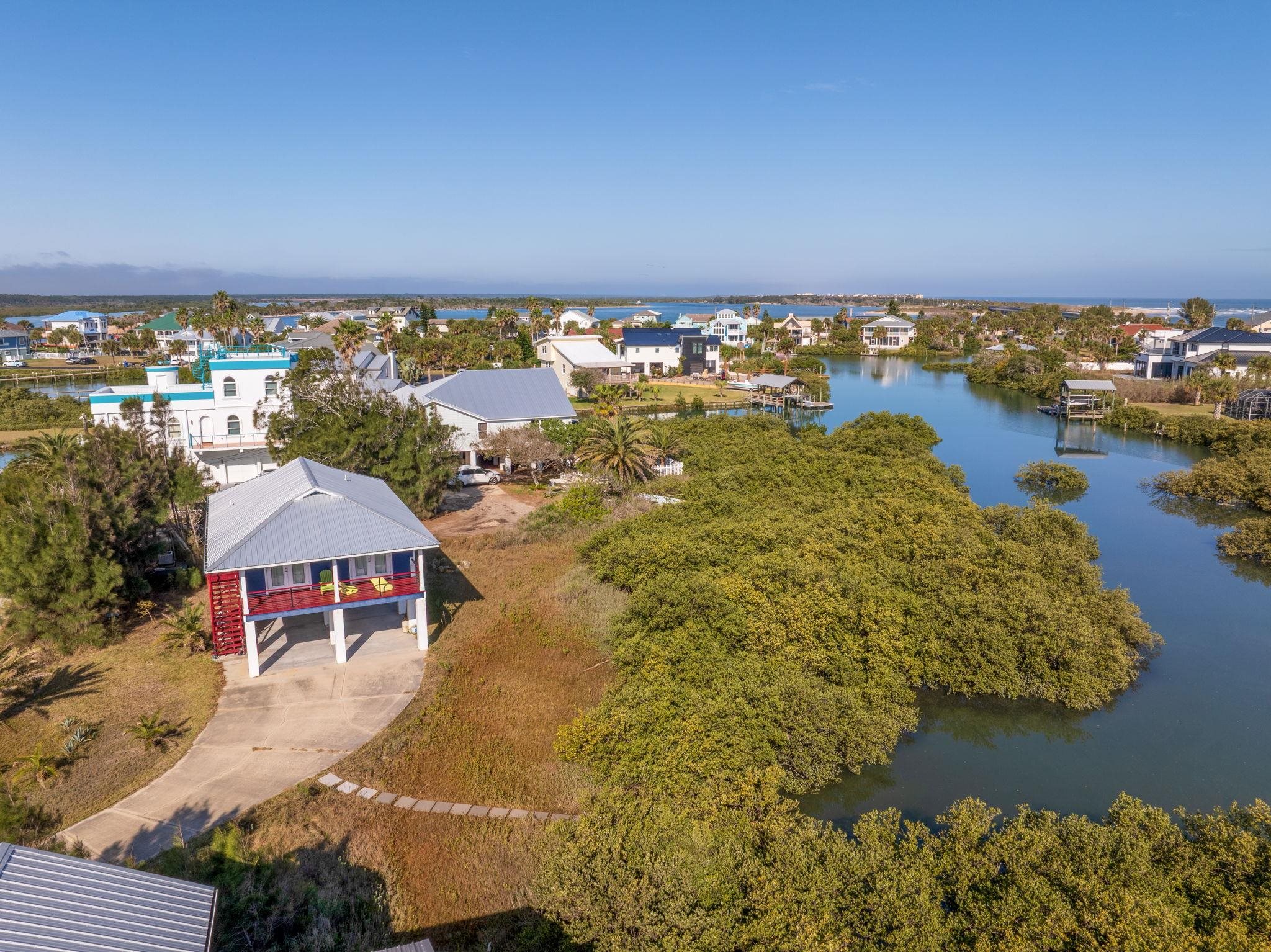 8950 Gene Johnson Road St. Augustine, FL 32080 - Photo 21 of 31 an aerial view of residential houses with outdoor space and lake view