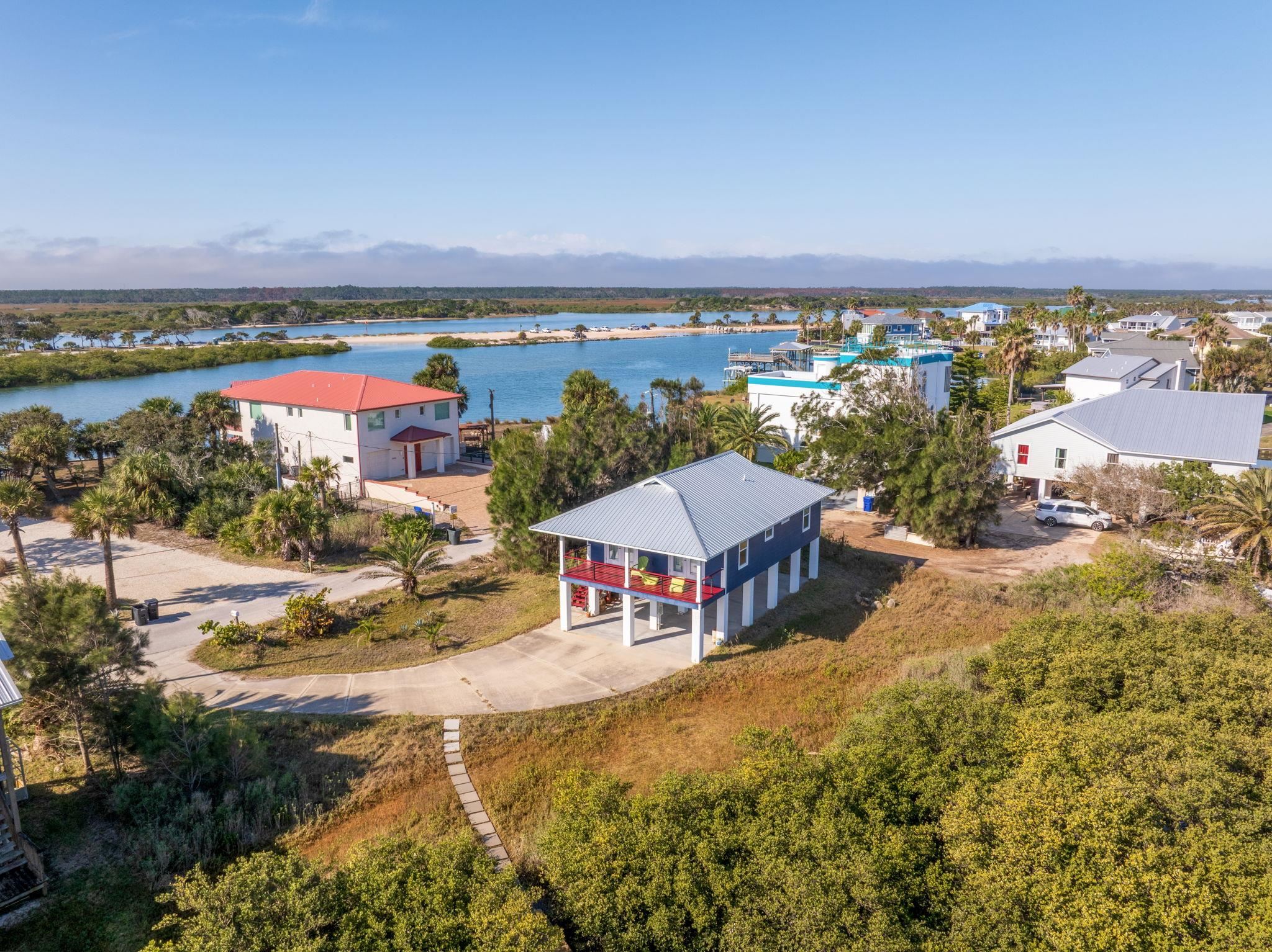 8950 Gene Johnson Road St. Augustine, FL 32080 - Photo 22 of 31 a view of a city with lawn chairs
