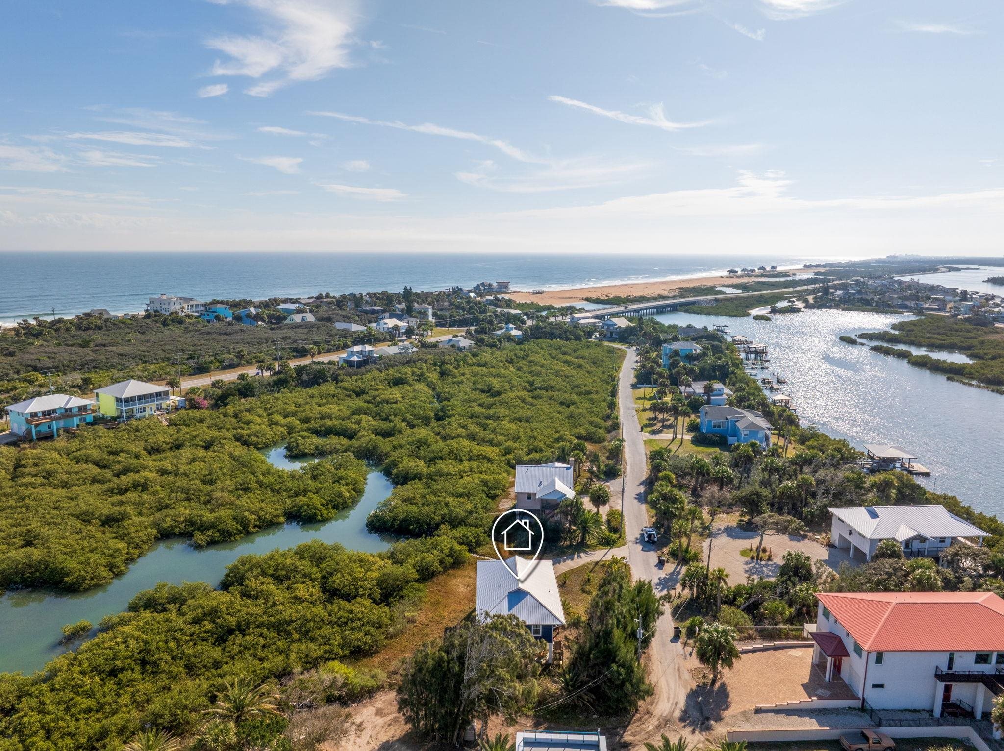 8950 Gene Johnson Road St. Augustine, FL 32080 - Photo 24 of 31 an aerial view of a city with lots of residential buildings ocean and mountain view in back