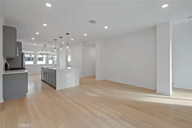 a view of a kitchen and kitchen with a sink