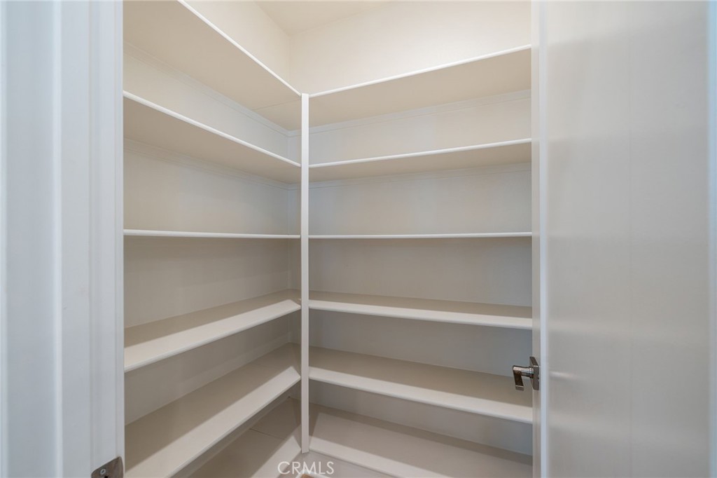 712 South Grable Circle Orange, CA 92868 - Photo 19 of 42 a view of walk in closet with empty racks